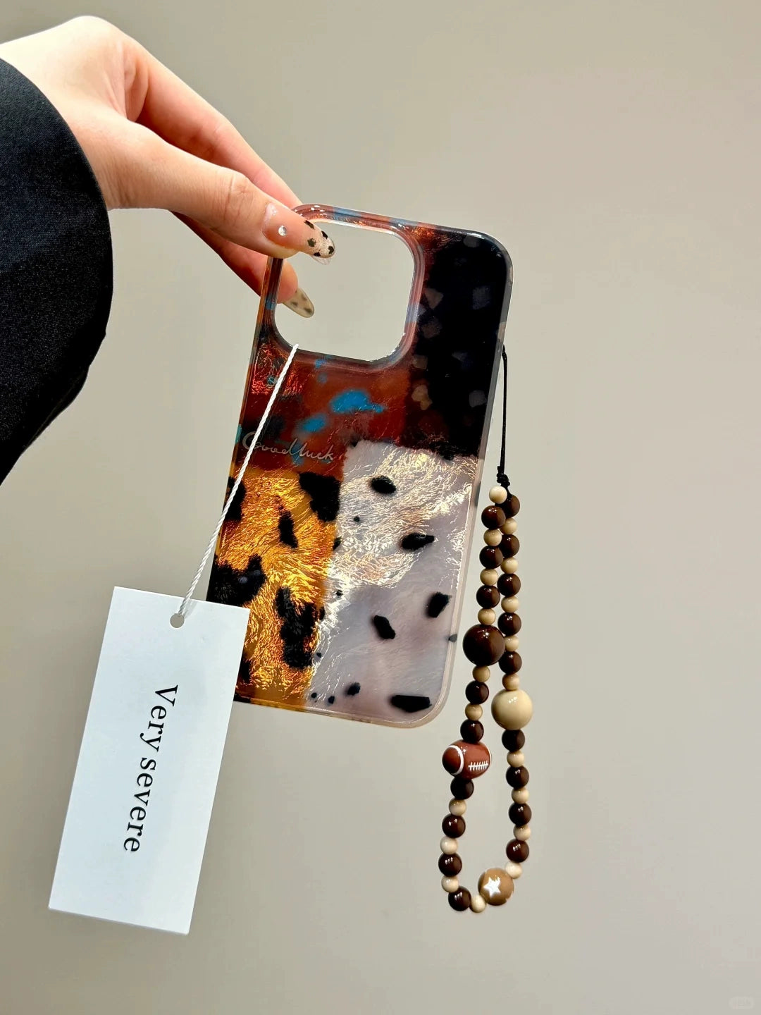 Retro Amber Leopard Print Splicing Mobile Phone Case with Beaded Mobile Phone Chain Pendant Suitable for iPhone16 iPhone15 iPhone14 iPhone13