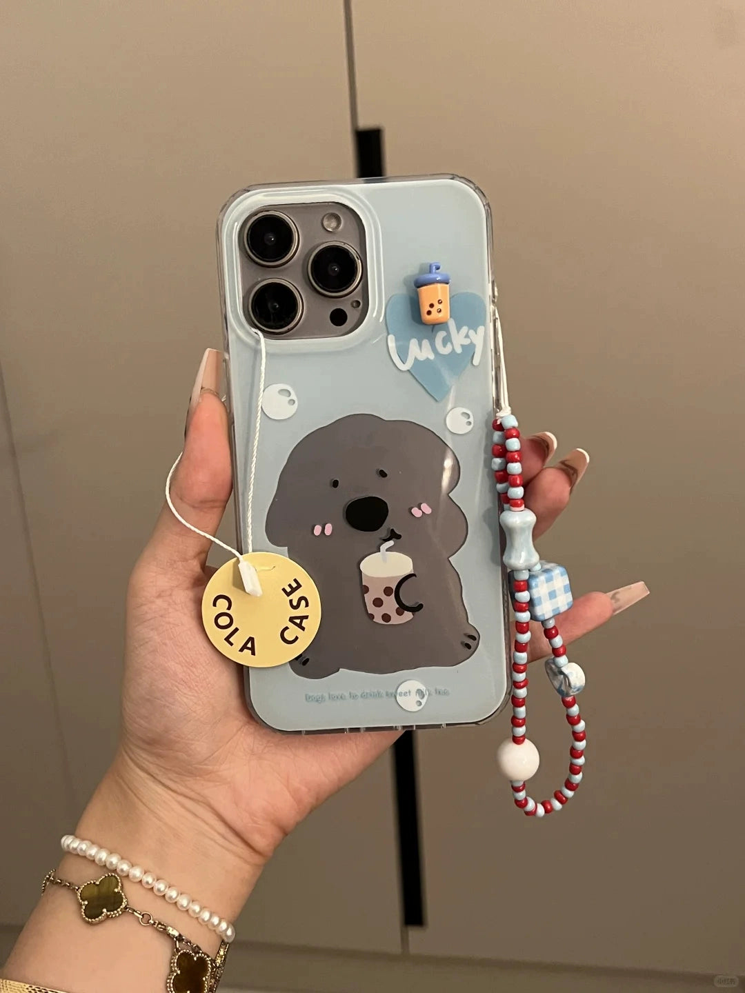 Dog Drinking Milk Tea Illustration Hollow Cute Mobile Phone Case with Mobile Phone Chain Pendant Suitable for iPhone16 iPhone15 iPhone14 iPhone13