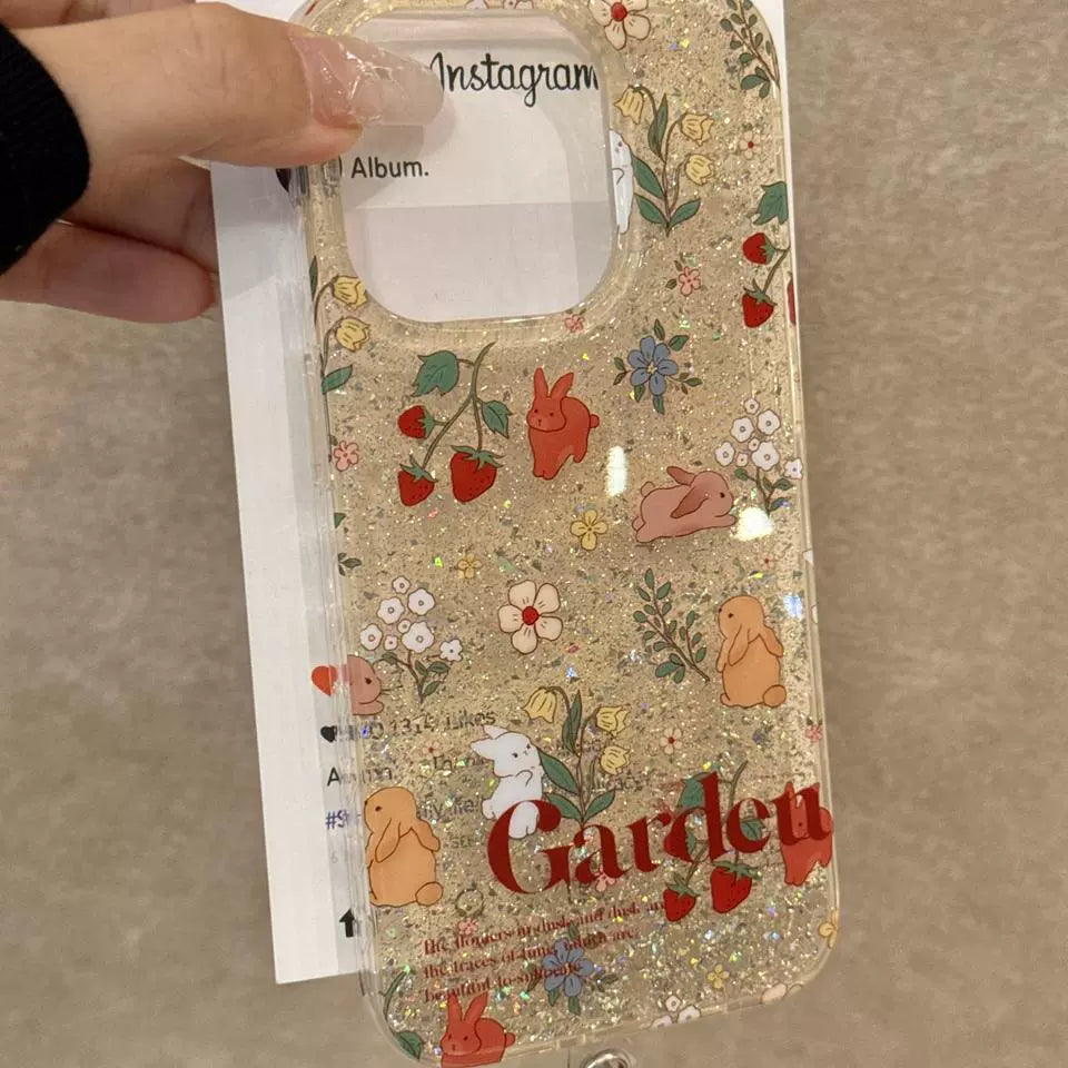 Pastoral Garden Cute Rabbit Strawberry Flower Shiny Aesthetic Mobile Phone Case, Suitable for iPhone16promax iPhone15pro iPhone14 iPhone13 with Mobile Phone Chain