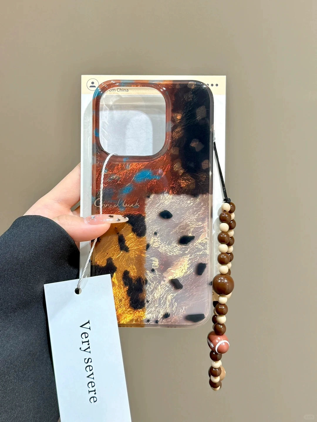 Retro Amber Leopard Print Splicing Mobile Phone Case with Beaded Mobile Phone Chain Pendant Suitable for iPhone16 iPhone15 iPhone14 iPhone13